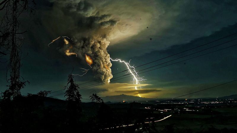 Taal volcano spews ash and debris kilometres into the sky